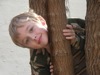 Ethan climbing a tree